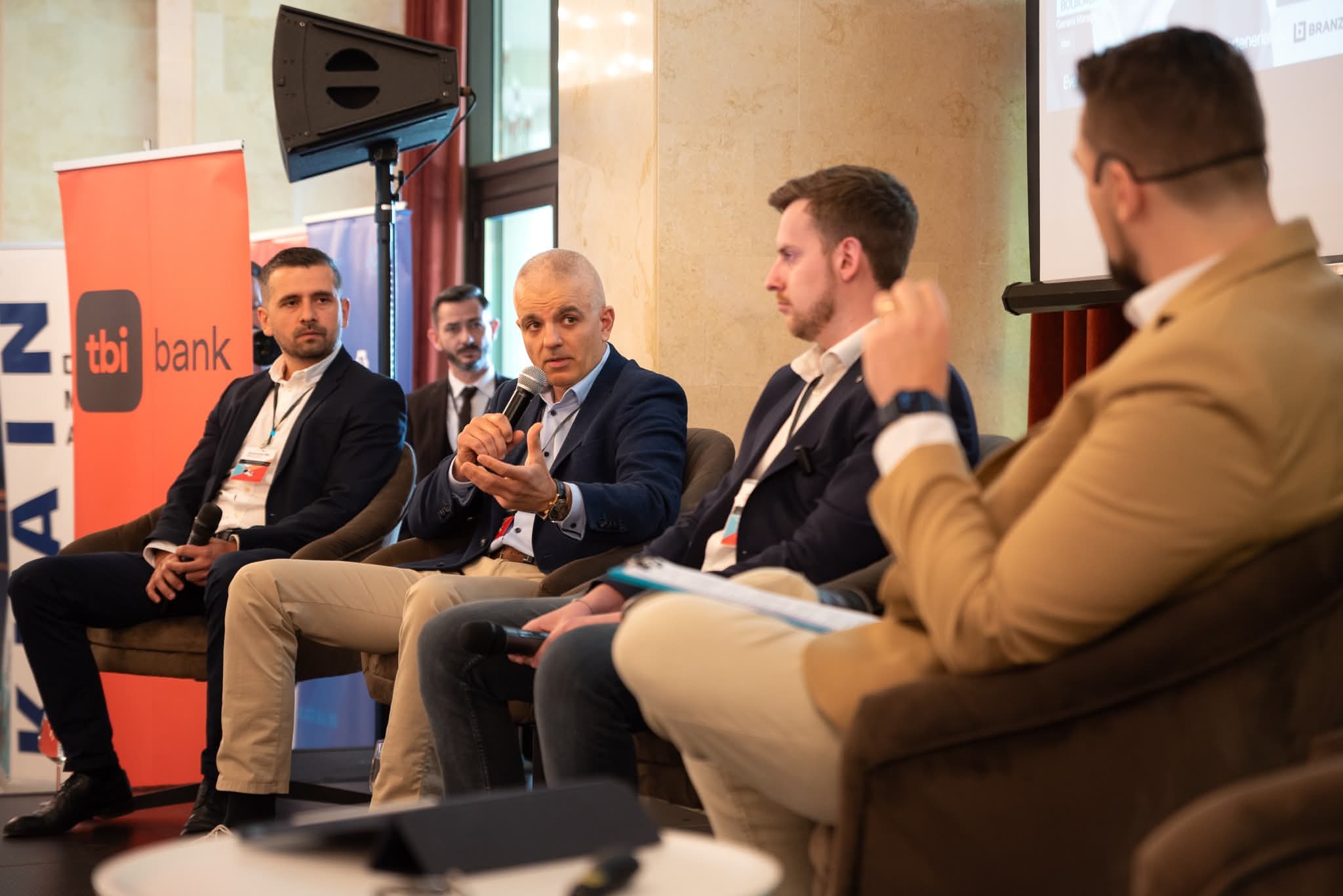 Ciprian speaking on a panel — Gamads founder